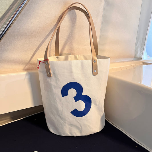 Ovalbunnet veske, med 3-tall og lyse "skinn"-remmer