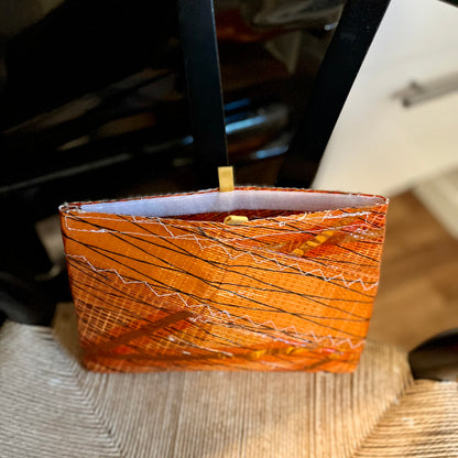 Oransje veske med innerlomme