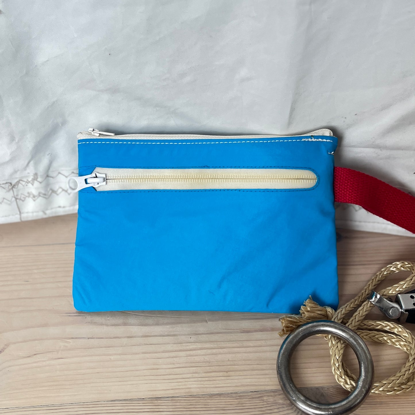 Liten clutch  fra seiljakke, med lomme