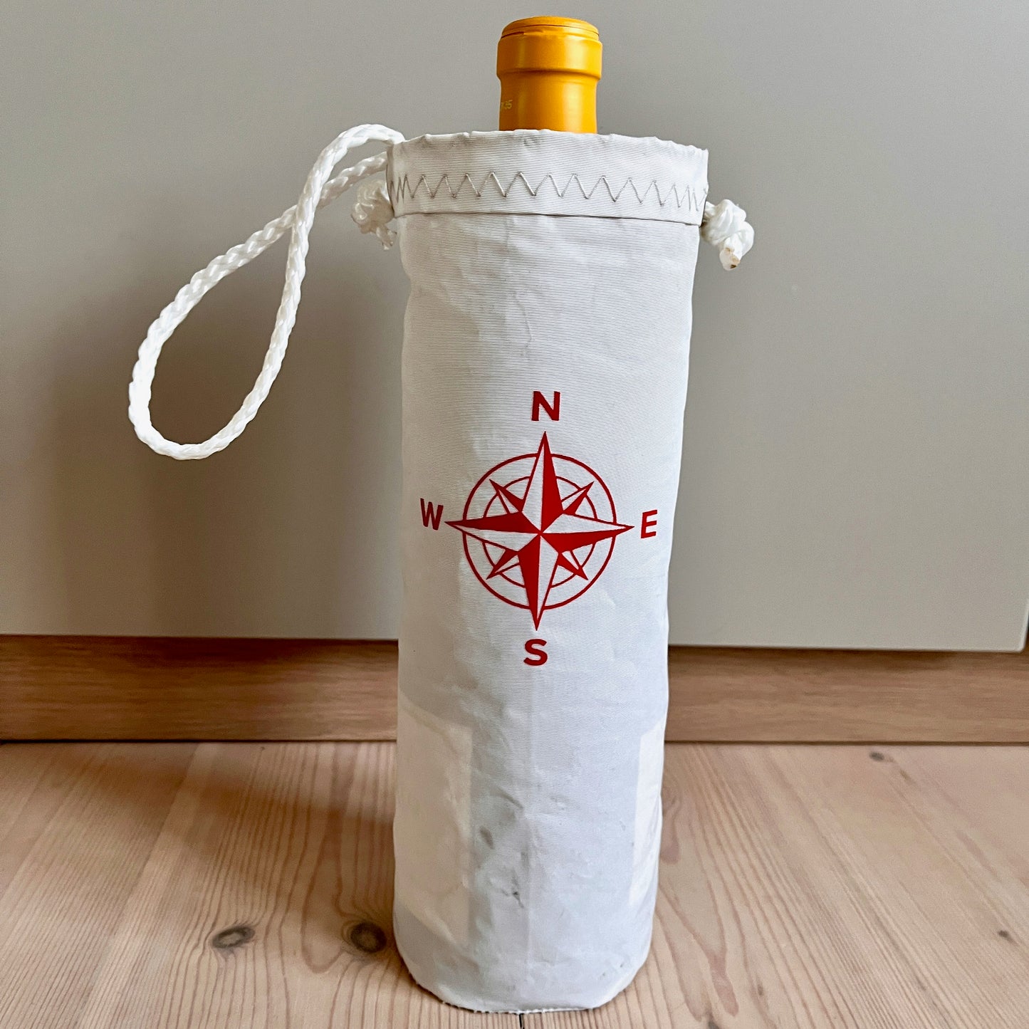 Flaske- /vinposer rødt kompass