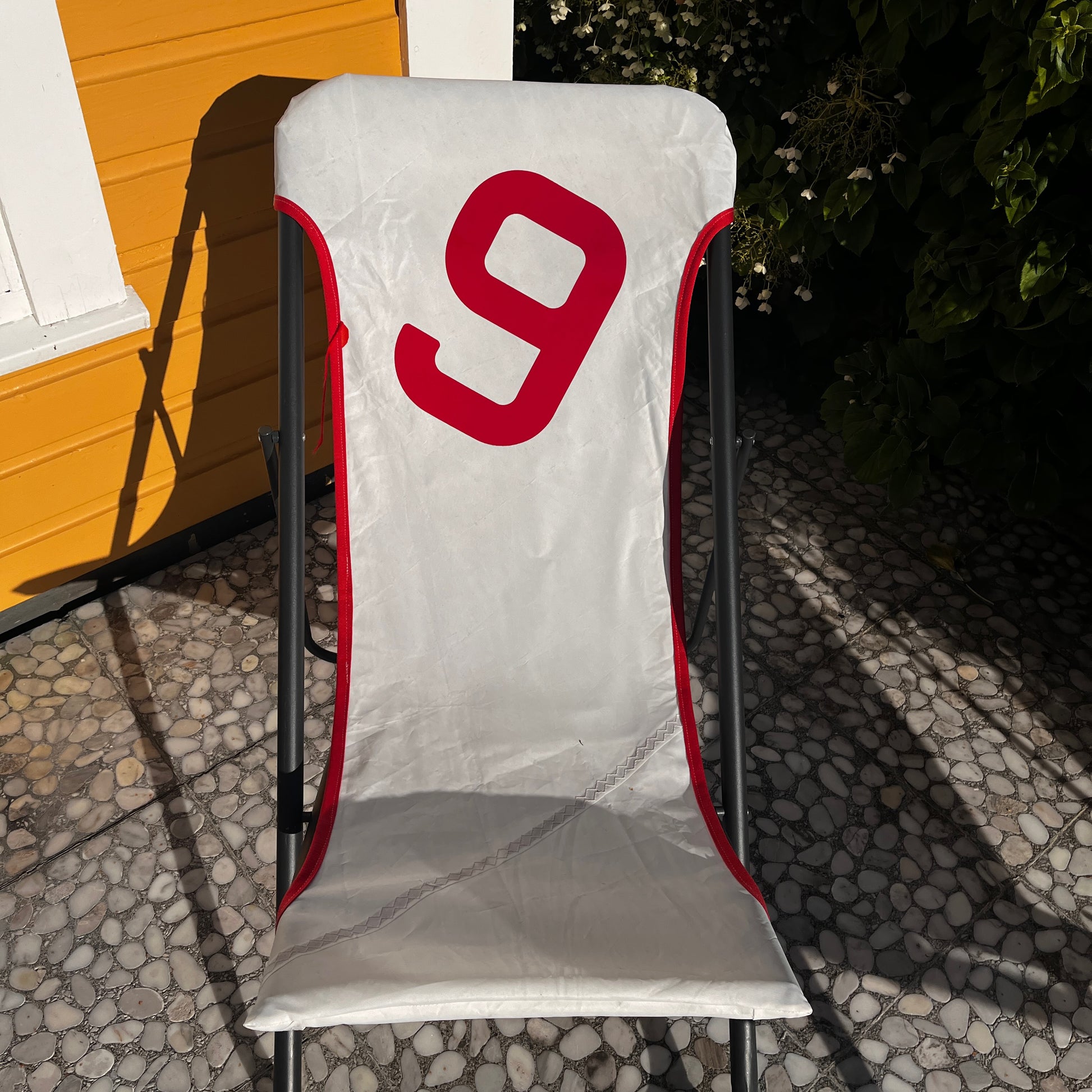Soltstol med seiltrekk