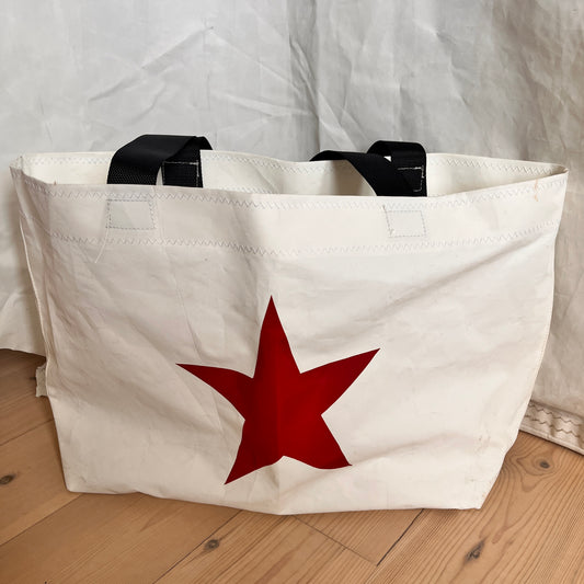 Stor bag med rød stjerne